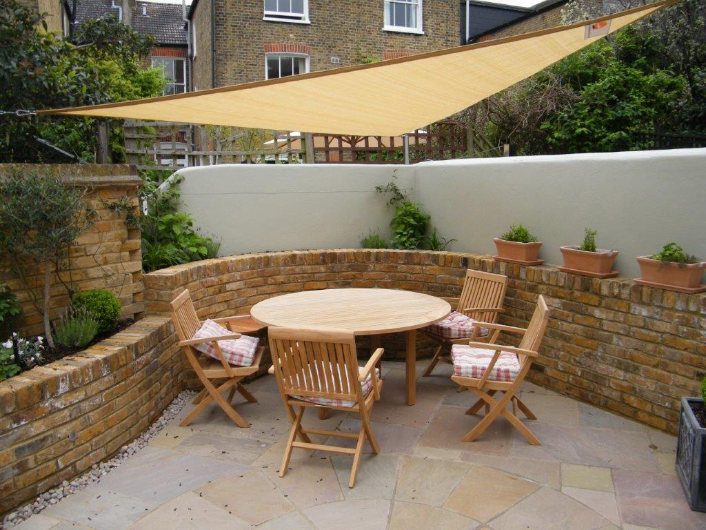 Modern garden design in Barnes, London with ornamental grasses